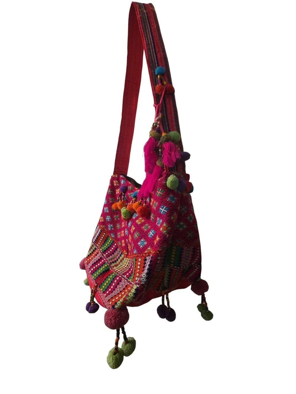Colorful, handcrafted bohemian shoulder bag with traditional woven details